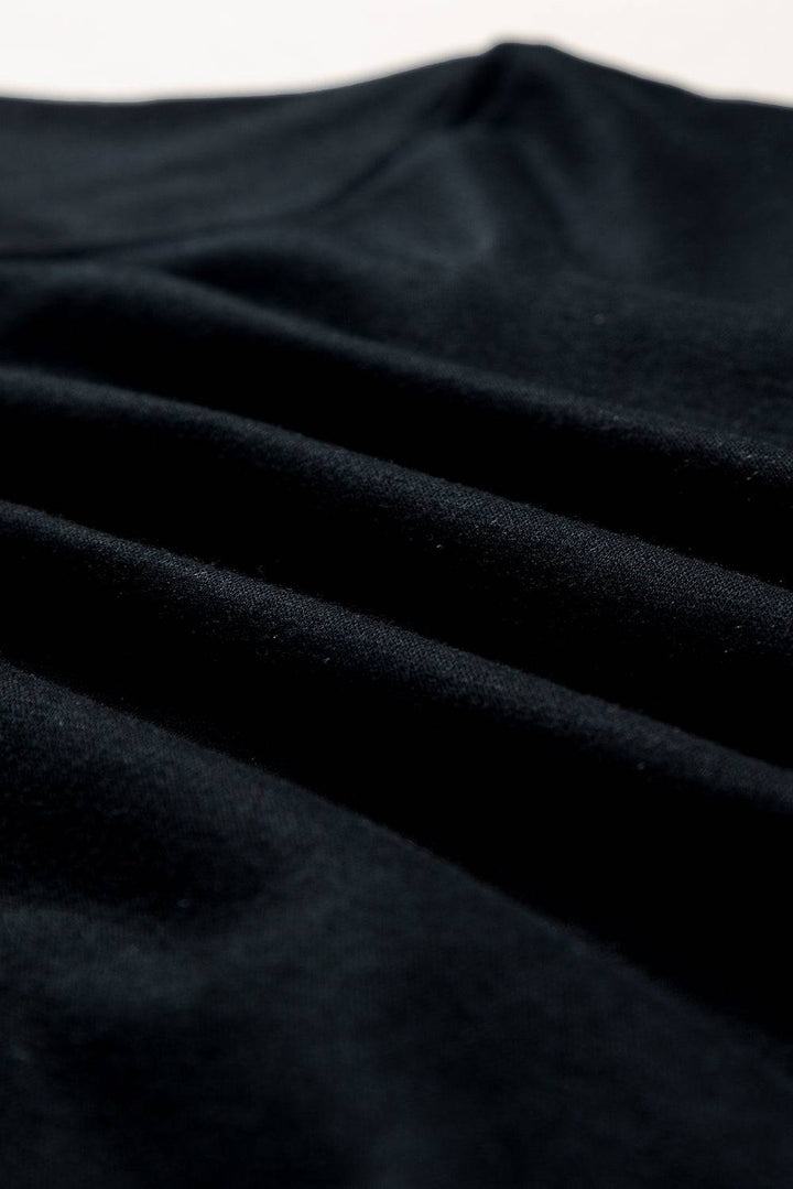 a close up of a black cloth with a white background