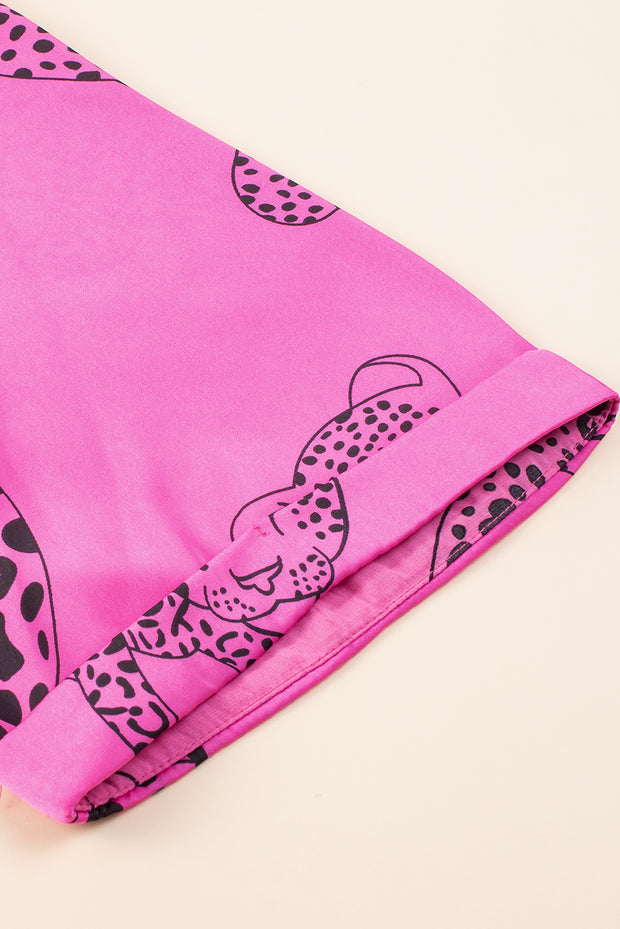 a pink towel with a black and white design on it