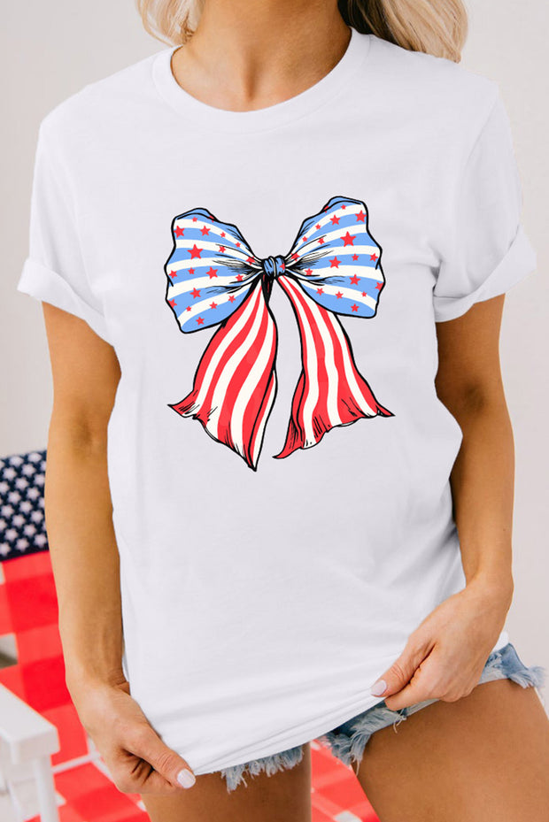 a woman wearing a white t - shirt with a red, white and blue bow