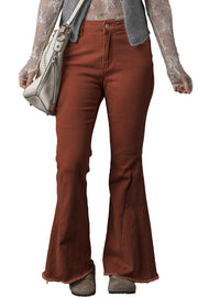a woman in brown pants and a lace top