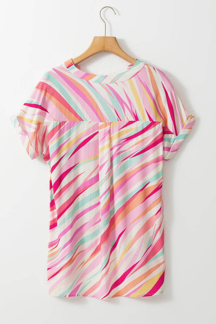 a colorful shirt hanging on a hanger