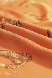 a close up of a fabric with a leopard pattern