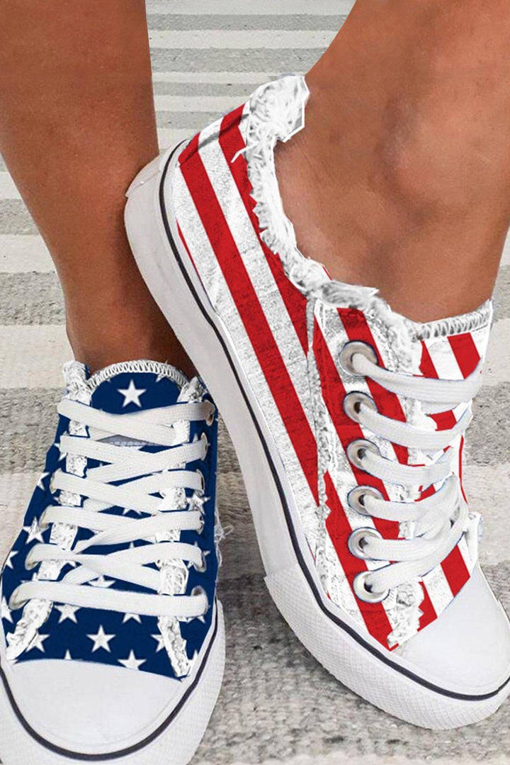 a close up of a person's legs wearing patriotic shoes