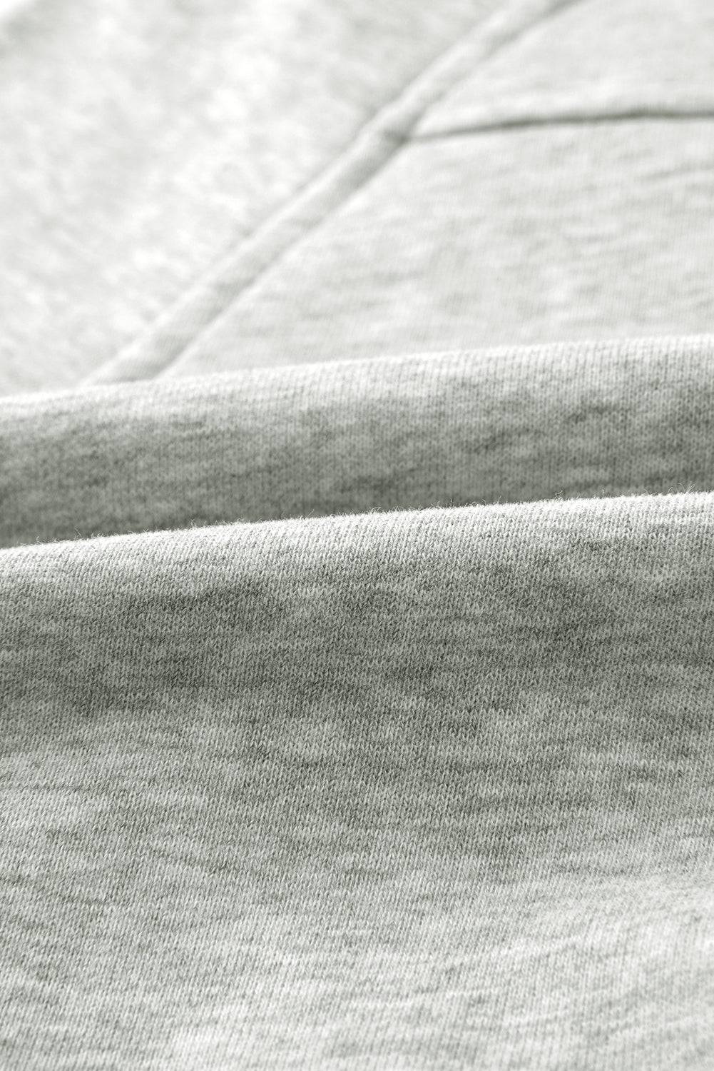 a black and white photo of a bed sheet