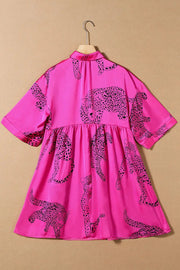 a pink dress with a leopard print on it