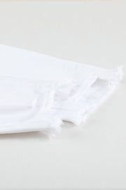 a piece of white fabric that has been torn