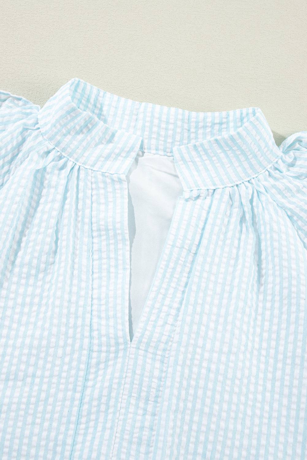 a close up of a blue and white shirt