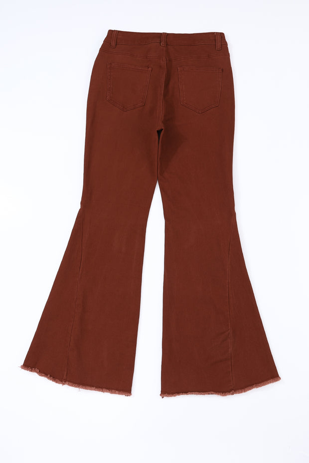 a pair of brown pants on a white background