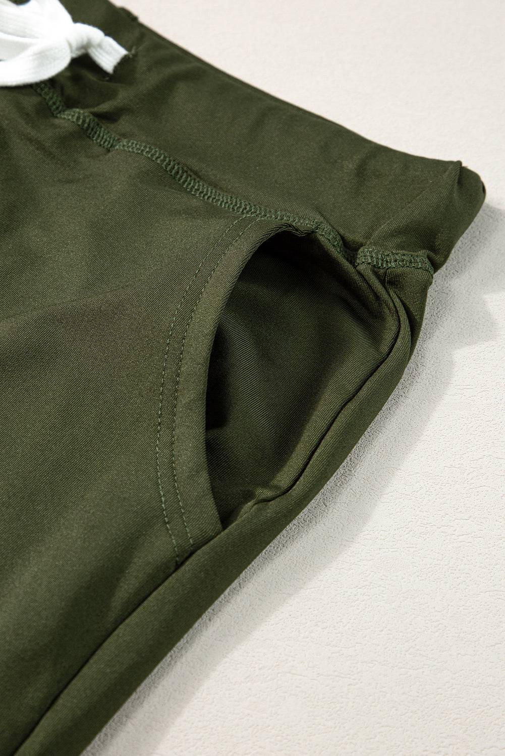 a close up of a pair of green pants