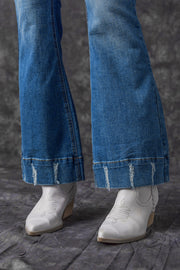 a pair of jeans with holes on them