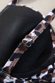a close up of a purse with a strap