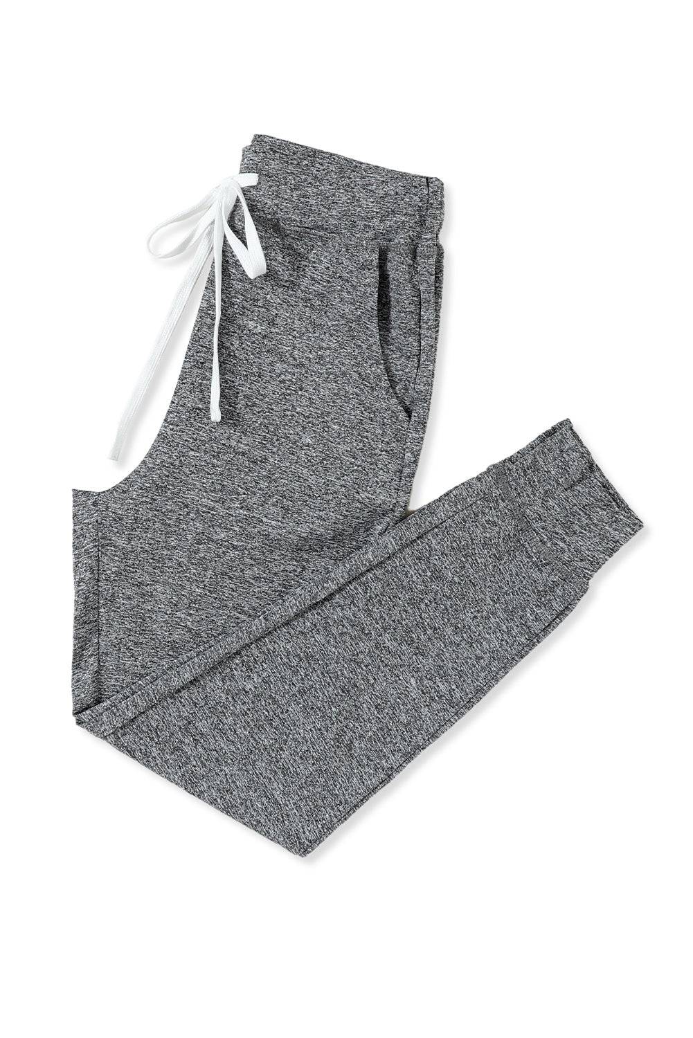 a pair of gray sweatpants with white drawstrings