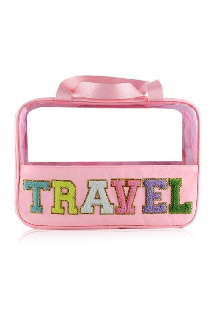 a pink bag with the word travel on it