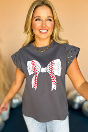 a woman wearing a baseball bow t - shirt