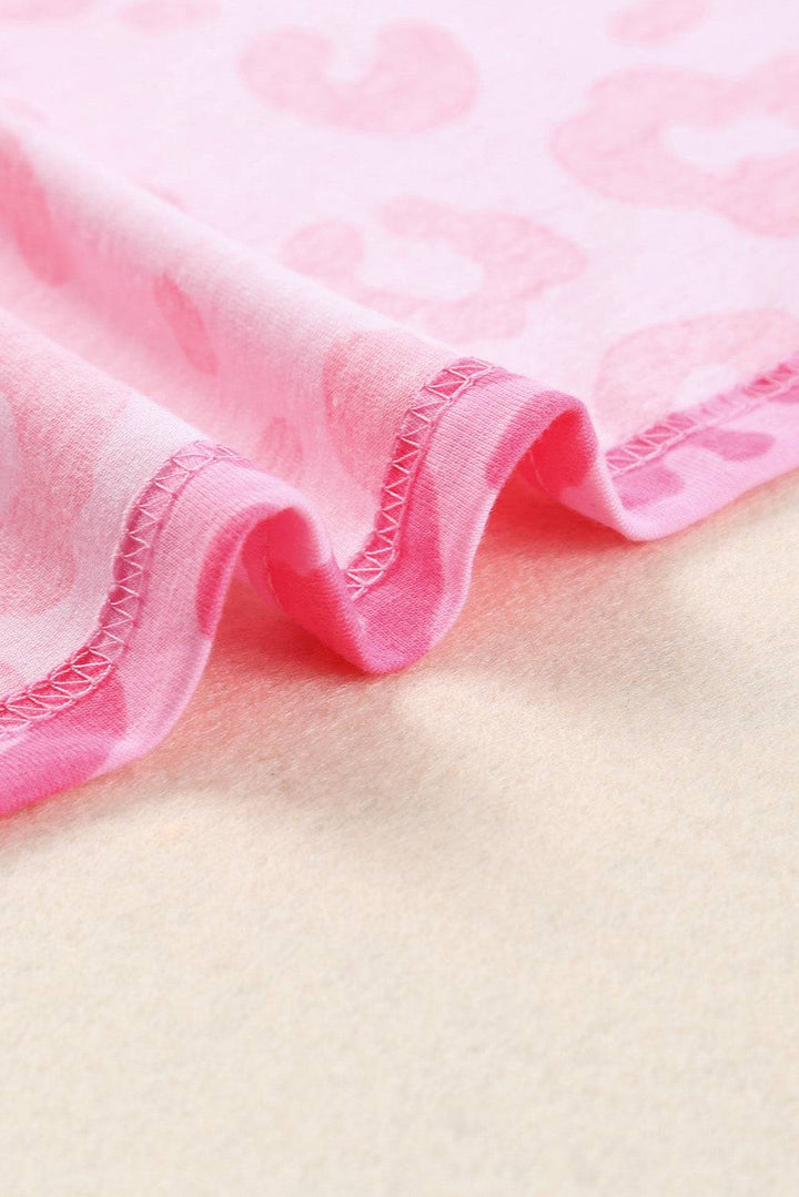 a close up of a pink and white polka dot fabric