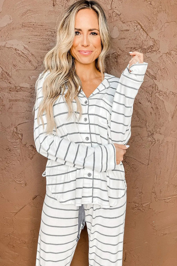 a woman wearing a white and black striped pajamas