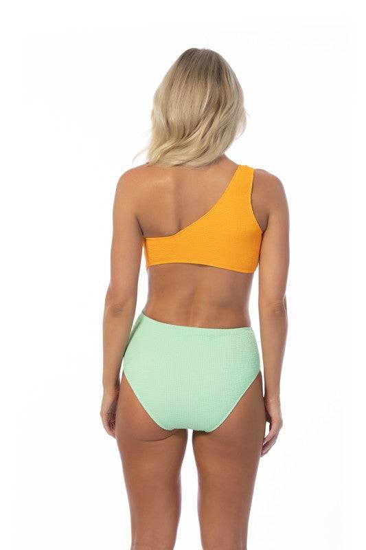 Rear view of TEXTURED TWO TONE ONE SHOULDER ONE PIECE in orange and mint. Modern swimwear with colorblock and textured fabric.