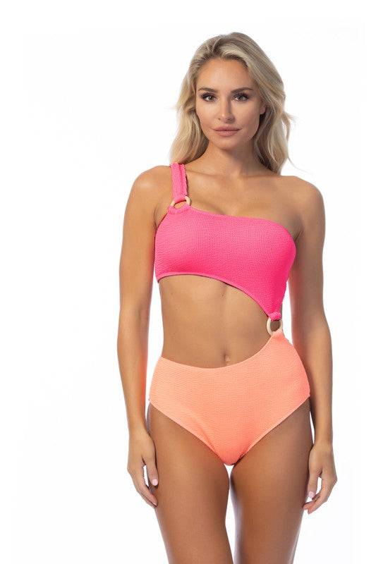 Front view of TEXTURED TWO TONE ONE SHOULDER ONE PIECE in pink and peach. Stylish cutout with ring detail and textured fabric.