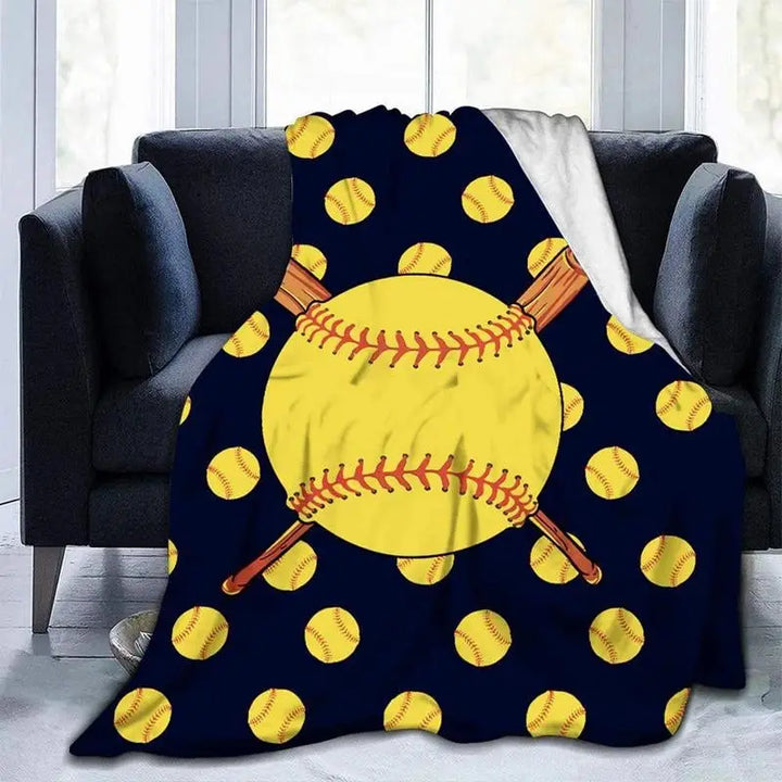 a throw blanket with a baseball and bat on it