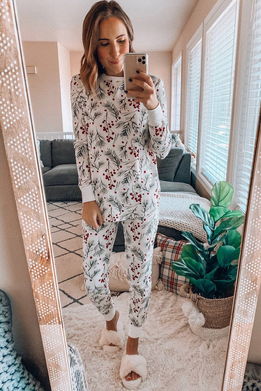 a woman taking a selfie in her pajamas