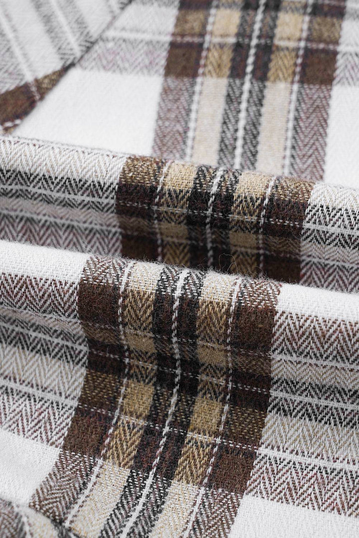 a close up of a plaid fabric