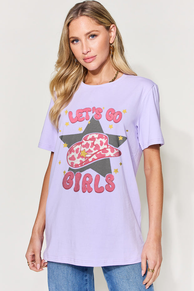 a woman wearing a purple shirt that says let's go girls