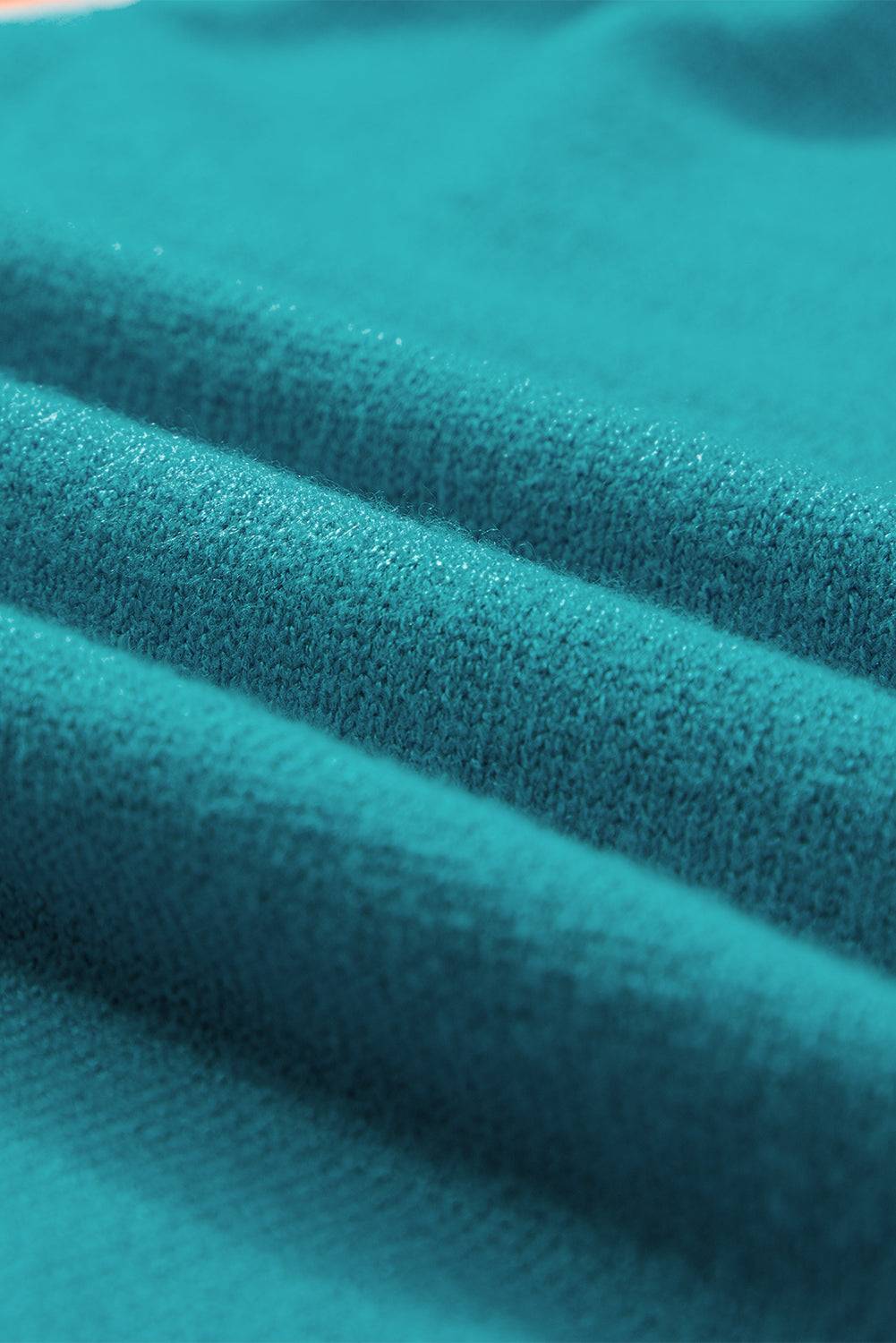 a close up view of a blue fabric