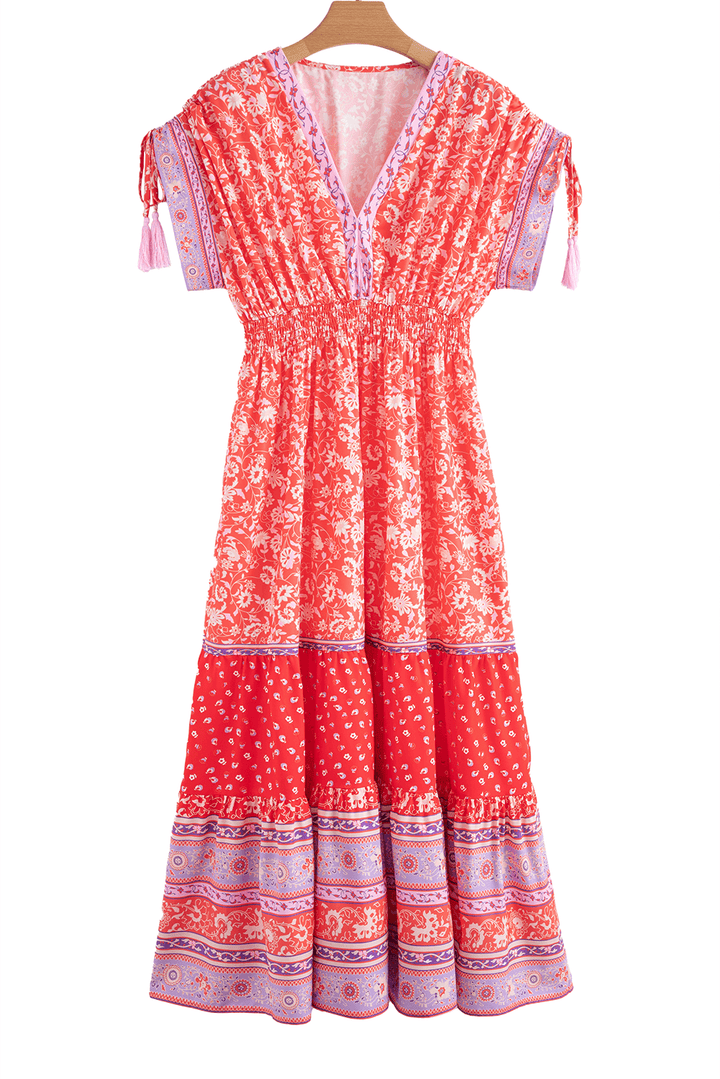 studio shot of Red Floral Print Tasseled Tied Sleeve Empire Waist Maxi Dress on hanger, showcasing full design and color palette