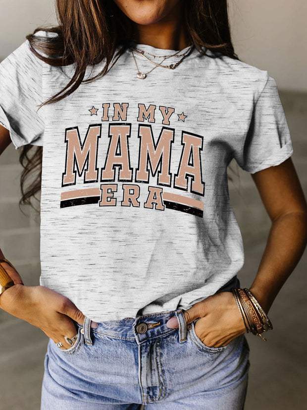 a woman wearing a t - shirt that says in my mama era