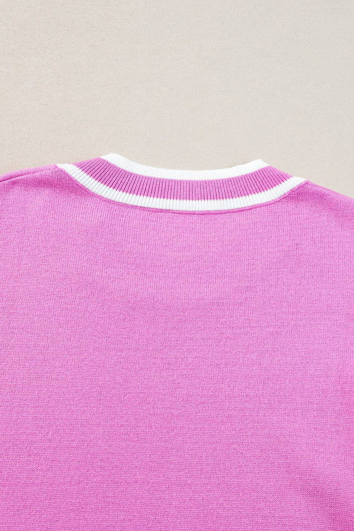 a close up of a pink shirt with white stripes