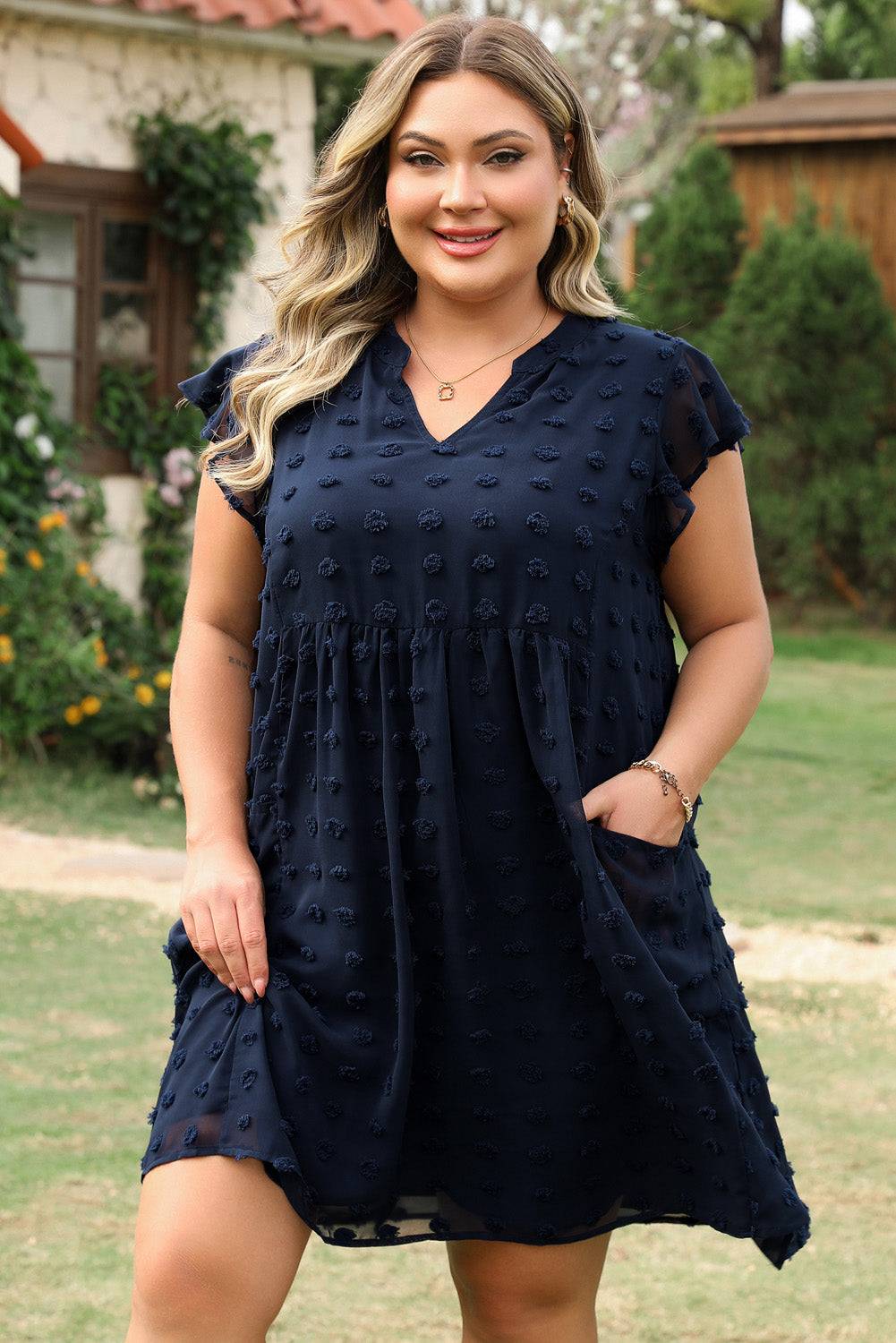Front view of Navy Blue Dotty Textured Notched Neck Plus Ruffled Dress with pockets, styled for comfort and elegance in warm weather.