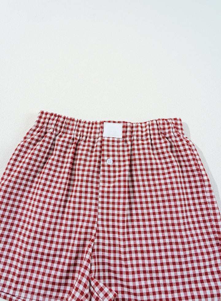 Top section of Red Plaid Gingham Printed High Waist Shorts showing elastic waist and pleated design. Perfect for daily summer outfits at Faith & Co. Boutique.