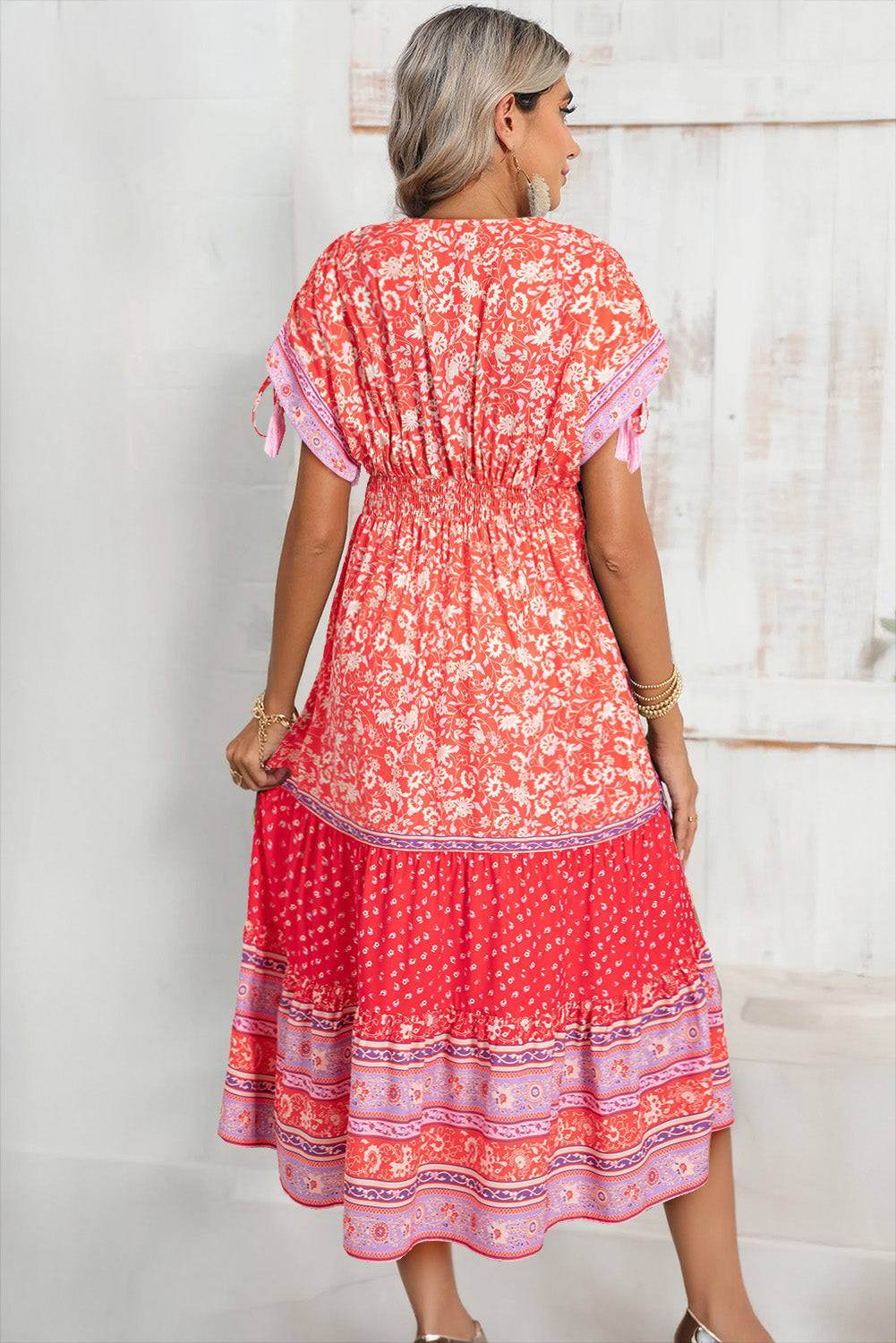 back view of Red Floral Print Tasseled Tied Sleeve Empire Waist Maxi Dress, ideal for summer getaways and casual outings