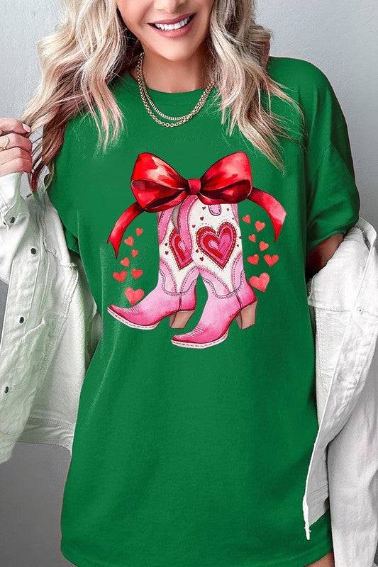 Green Valentine Cowgirl Boots Graphic Heavy Cotton Tee with pink boots and red hearts, perfect for holidays at Faith & Co. Boutique.