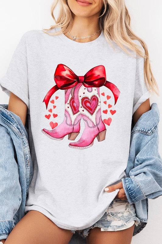 Heather gray Valentine Cowgirl Boots Graphic Heavy Cotton Tee with pink heart boots and red bow, shop now at Faith & Co. Boutique.
