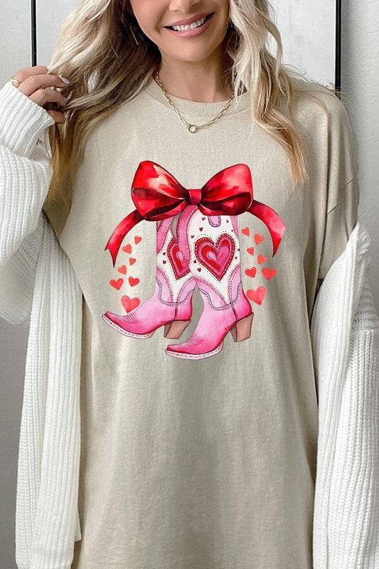 Beige Valentine Cowgirl Boots Graphic Heavy Cotton Tee with pink boots and heart accents, available at Faith & Co. Boutique.