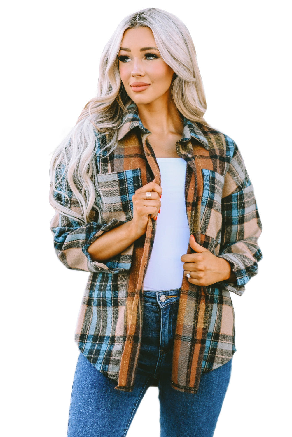 a woman wearing a plaid shirt and jeans