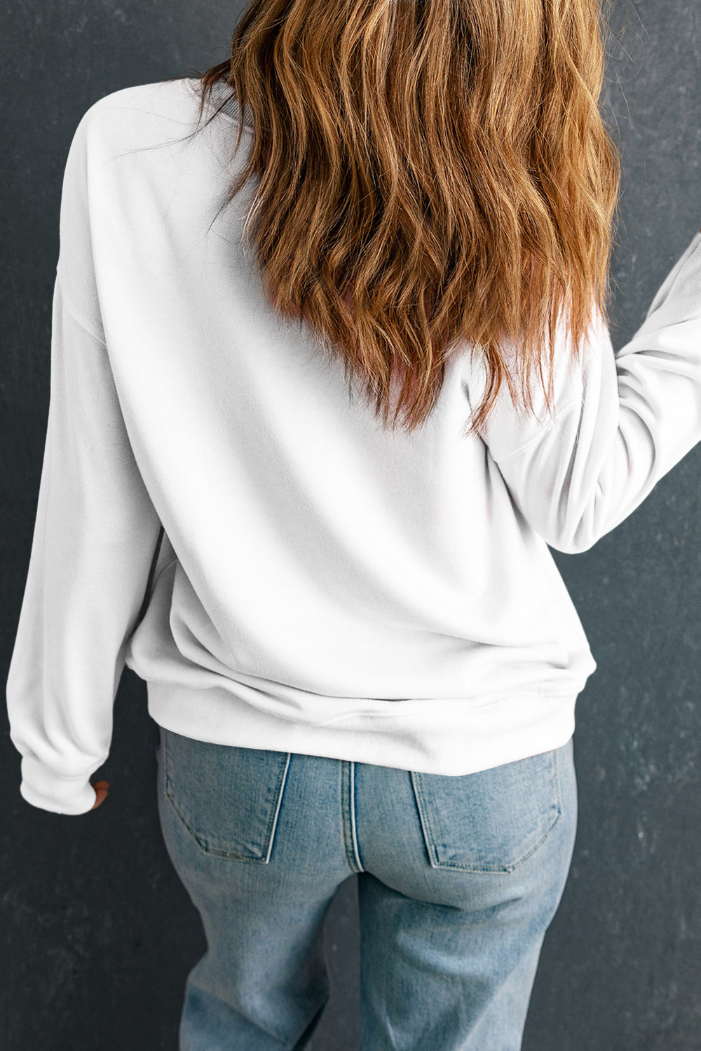 Back view of the Beige MERRY Christmas Heat Transfer Printing Crewneck Pullover Sweatshirt, showcasing relaxed fit and soft fabric in casual fall style.