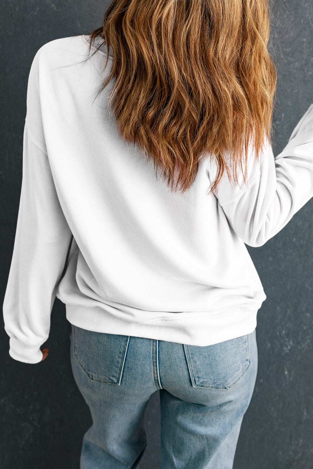 Back view of the Beige MERRY Christmas Heat Transfer Printing Crewneck Pullover Sweatshirt, showcasing relaxed fit and soft fabric in casual fall style.