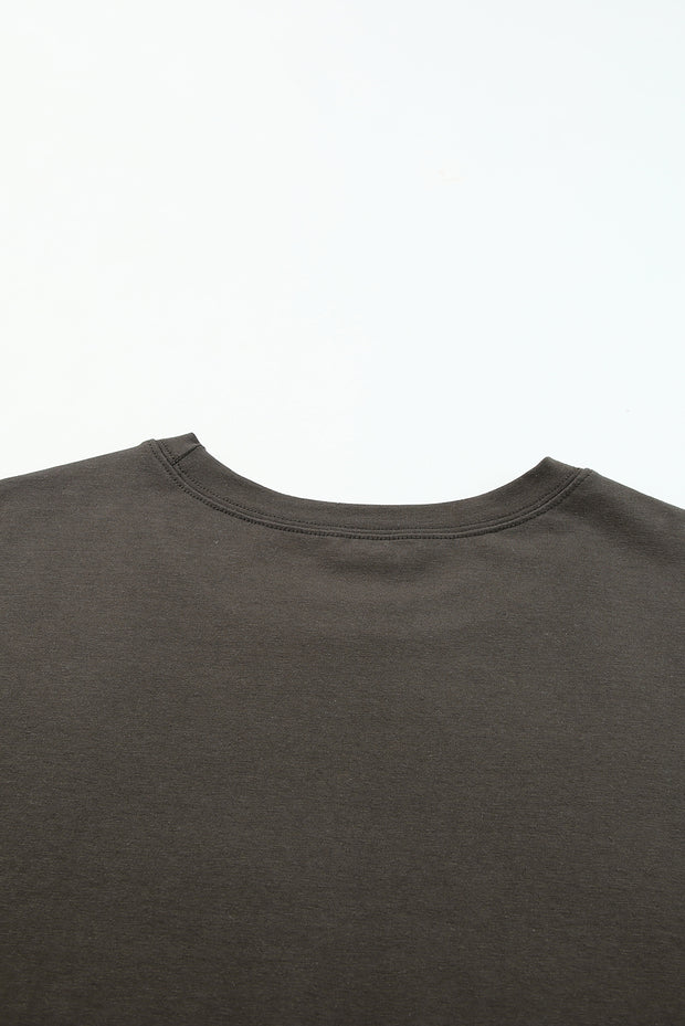 a black t - shirt with a white background