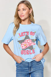 a woman wearing a blue shirt that says let's go girls