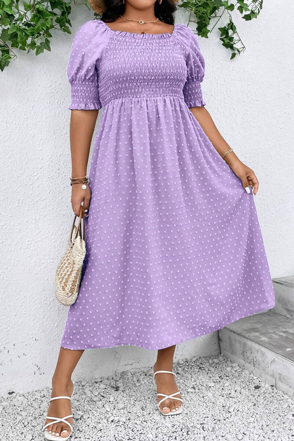 Front view of Wisteria Swiss Dot Smocked Frilled Neckline Plus Size Dress with puff sleeves and flowy skirt, perfect for summer occasions.