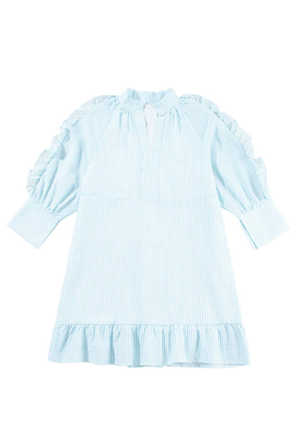 a blue and white striped dress with ruffled sleeves