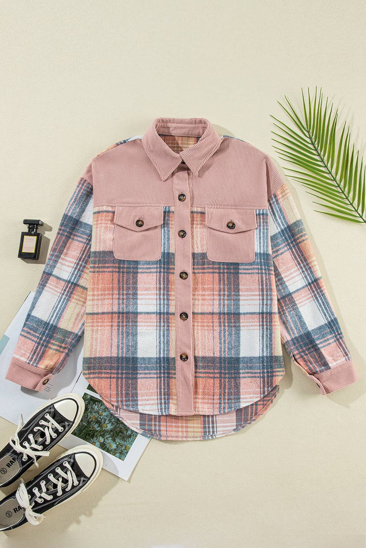 a pink and blue plaid shirt next to a pair of sneakers