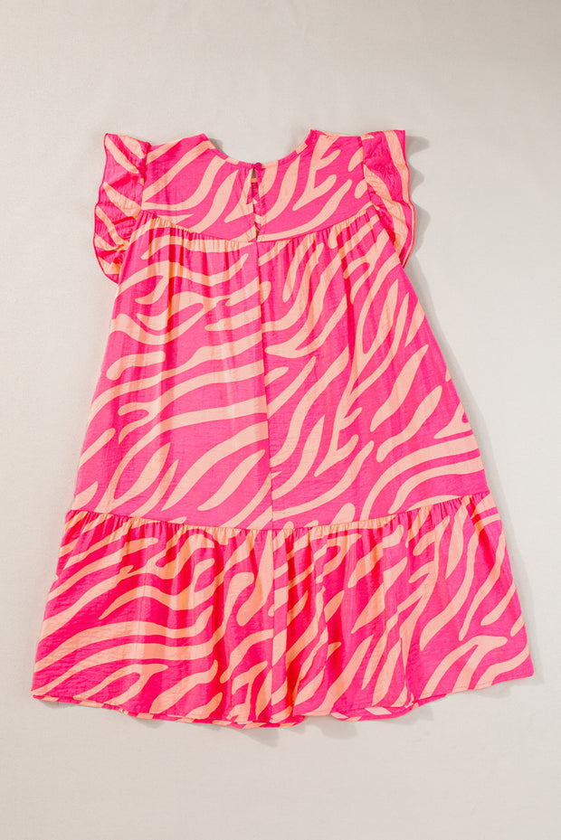 a pink and white zebra print dress on a white background