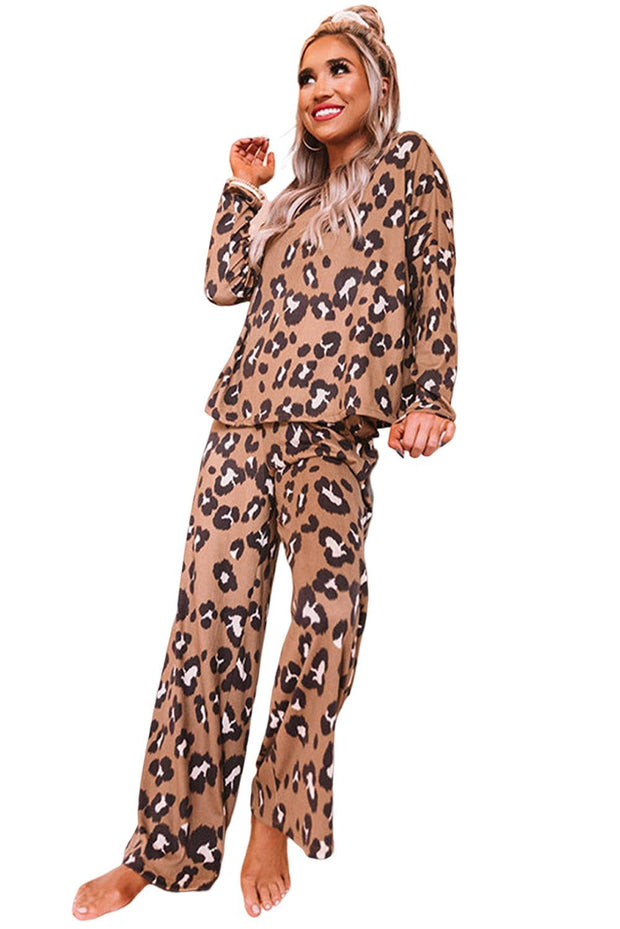 a woman in a leopard print pajama set