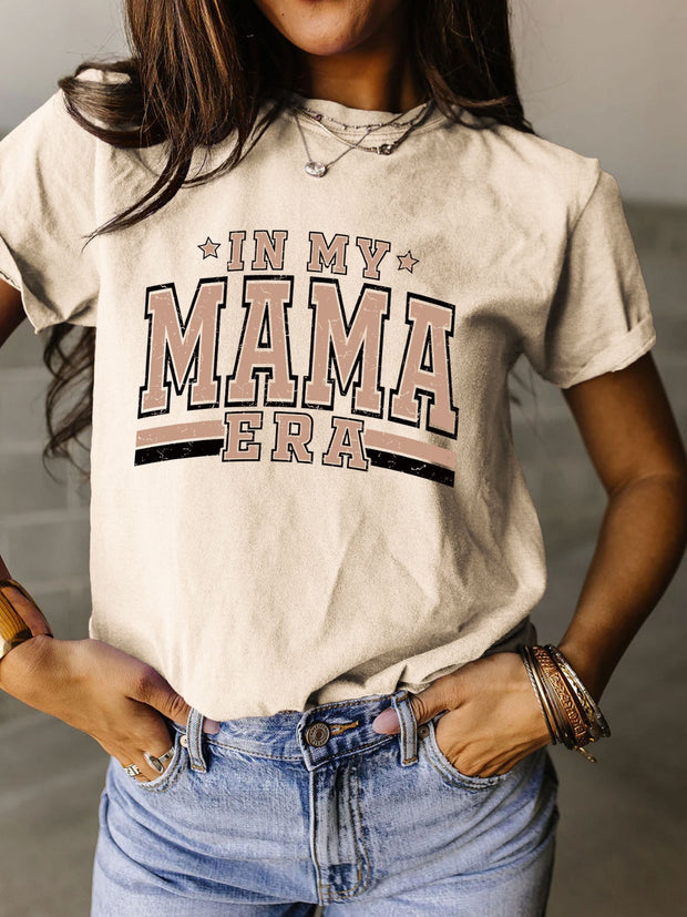 a woman wearing a shirt that says in my mama bra