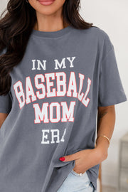 a woman wearing a baseball mom t - shirt