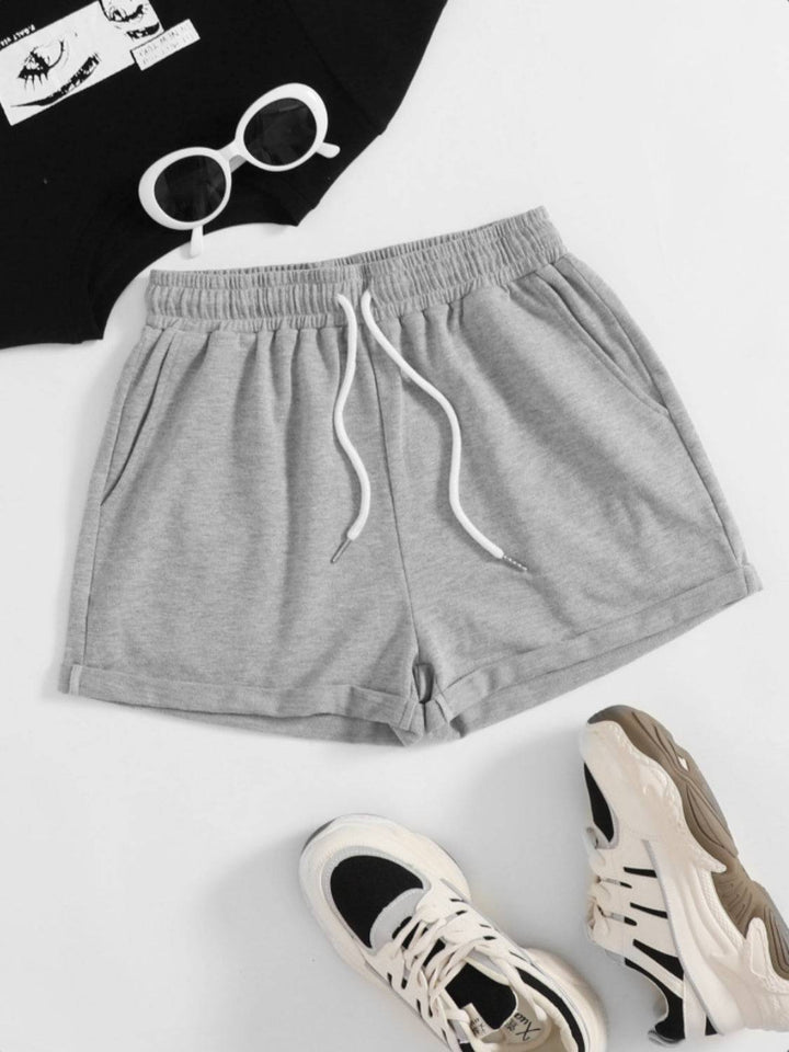 a pair of sneakers and a pair of shorts