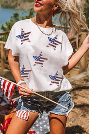 a woman in a patriotic shirt holding a flag